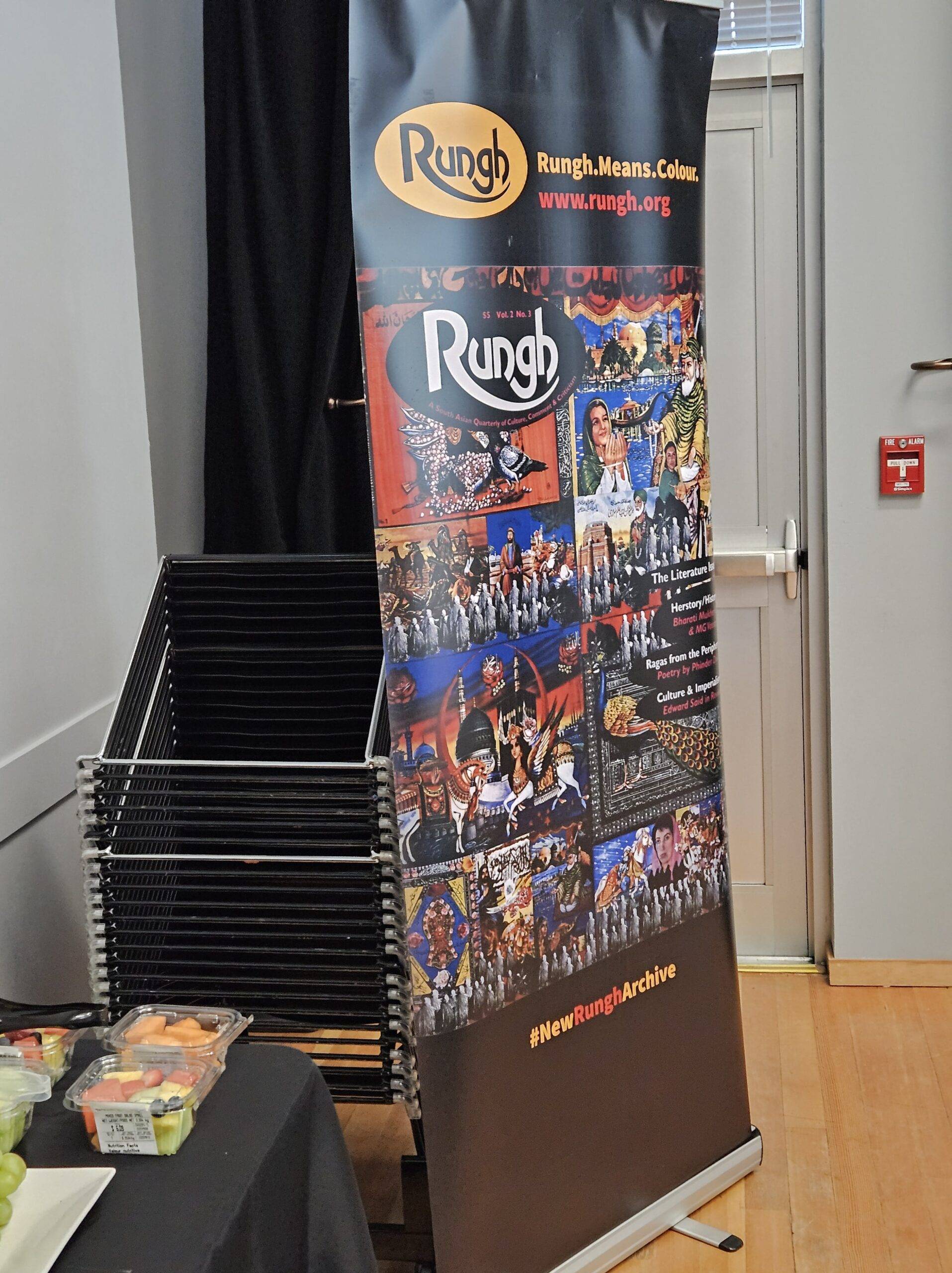 Colourful Rungh magazine display at cultural event, promoting South Asian arts and literature.