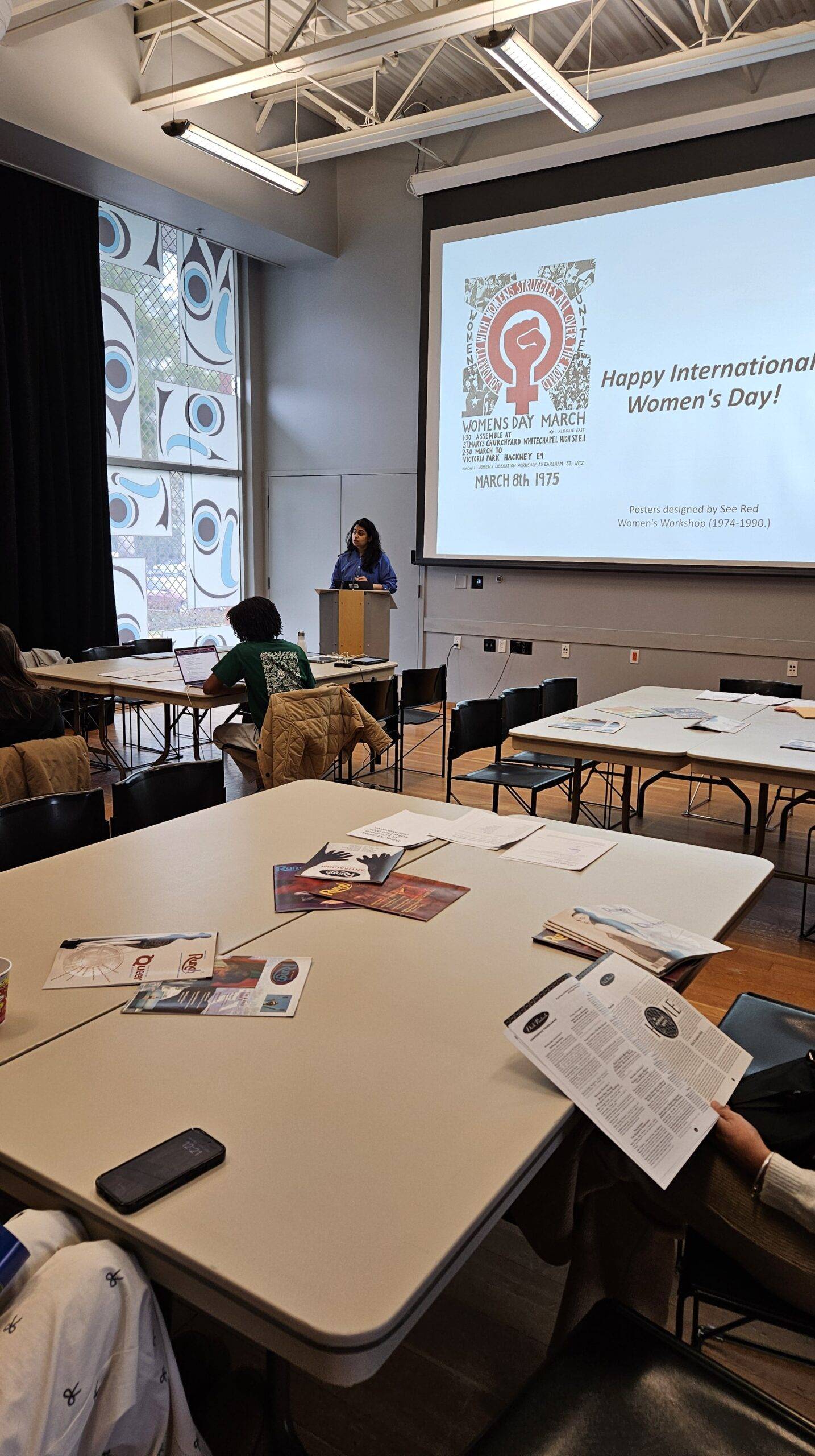 Women’s Day workshop presentation, celebrating International Women's Day and feminist posters.