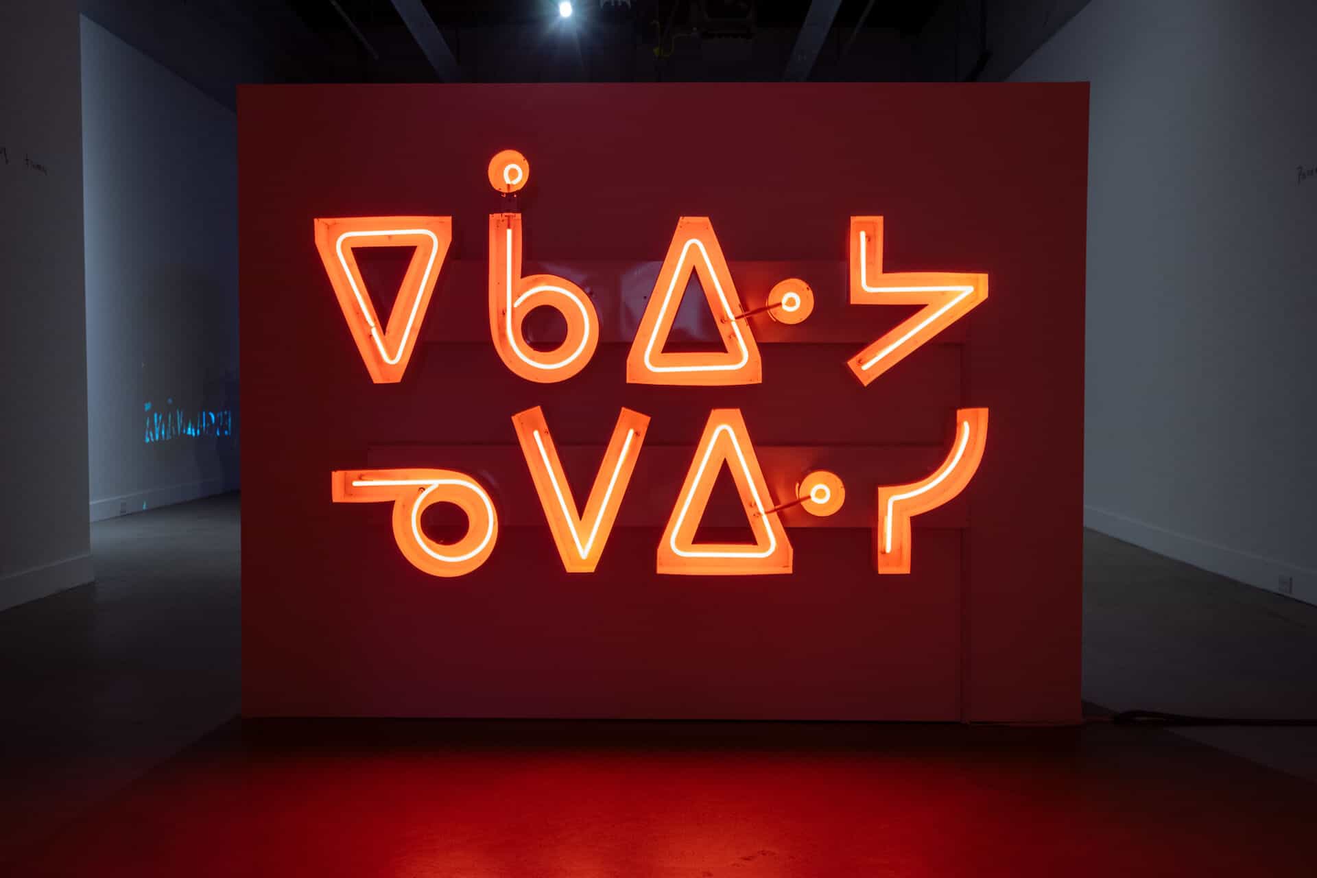 Joi T. Arcand, "ēkāwiya nēpēwisi (don’t be shy)", neon channel sign, 2017. Photo by Elyse Bouvier.